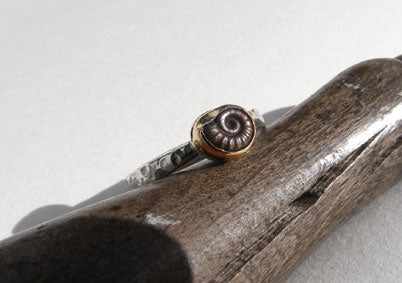 A one-off gold Ammonite ring