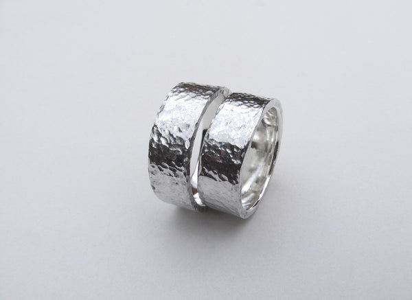 Heavy, hammered, molten ring in recycled silver Size P.5