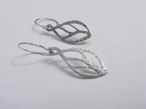 Silver cut out leaf drop earrings