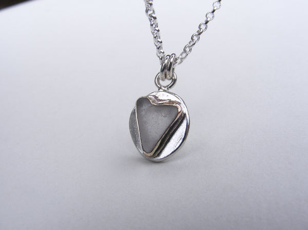 Sea Foam sea glass heart pendant in silver and gold accents