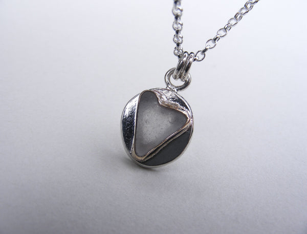 Sea Foam sea glass heart pendant in silver and gold accents