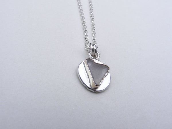 Sea Foam sea glass heart pendant in silver and gold accents