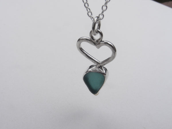 Turquoise Sea Foam blue Bezel set sea glass pendant with hand made silver heart