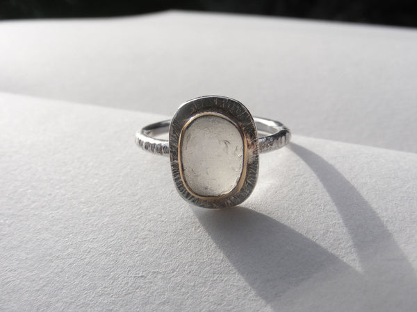 Clear sea foam sea glass ring bezel set in recycled 9ct gold