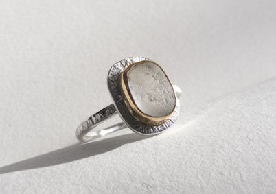 Clear sea foam sea glass ring bezel set in recycled 9ct gold