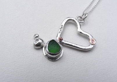 Sprite green sea glass heart and pebble details