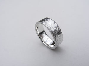 Heavy, hammered, molten ring in recycled silver Size P.5