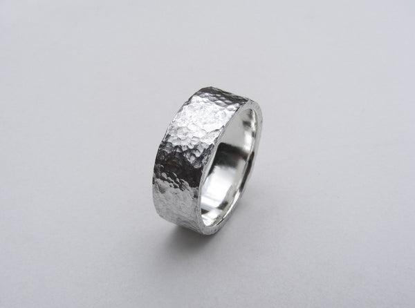 Heavy, hammered, molten ring in recycled silver Size P.5