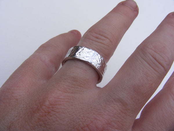Heavy, hammered, molten ring in recycled silver Size P.5