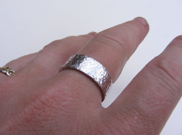 Heavy, hammered, molten ring in recycled silver Size P.5