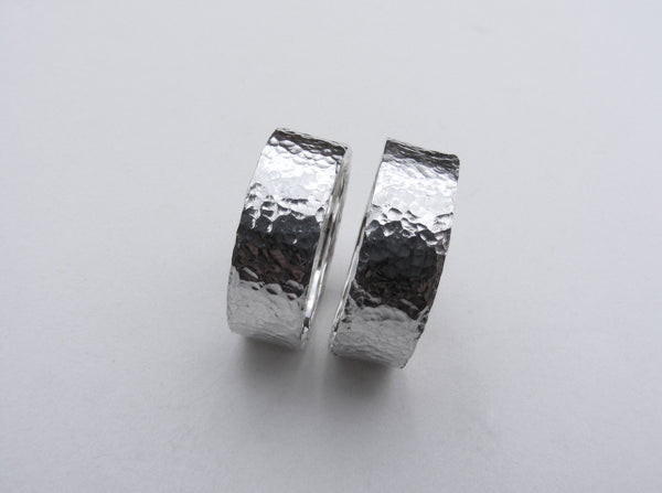 Heavy, hammered, molten ring in recycled silver Size P.5