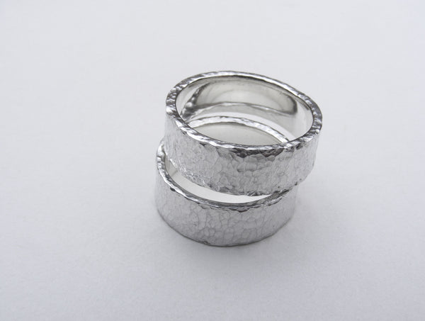 Heavy, hammered, molten ring in recycled silver Size P.5