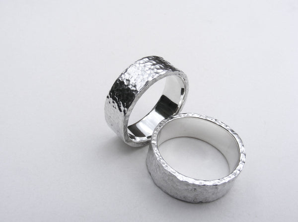 Heavy, hammered, molten ring in recycled silver Size P.5