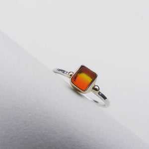 Sunrise sea glass ring. Bezel set in recycled 9ct gold with silver shank. Size O