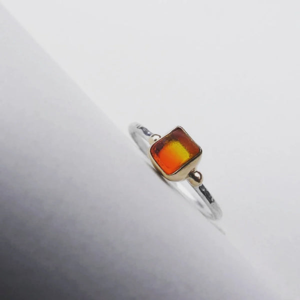 Sunrise sea glass ring. Bezel set in recycled 9ct gold with silver shank. Size O