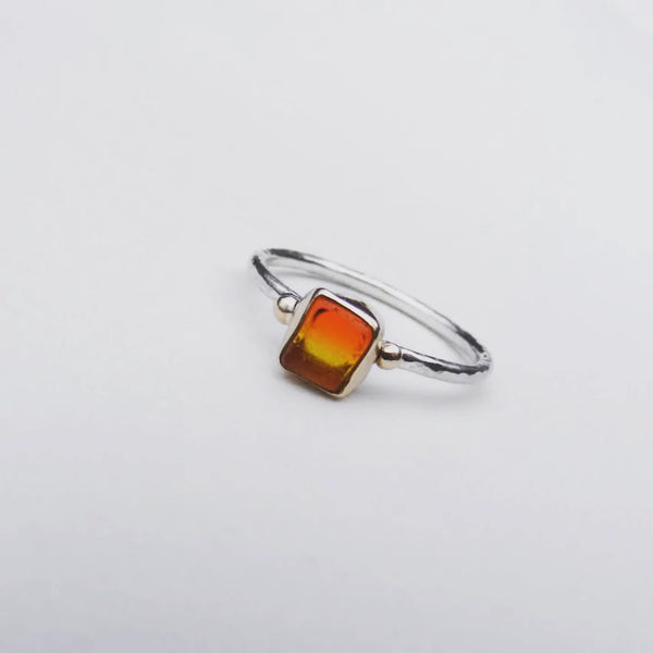 Sunrise sea glass ring. Bezel set in recycled 9ct gold with silver shank. Size O