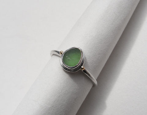 Sprite Green seaglass silver ring with gold nugget details. Q.5