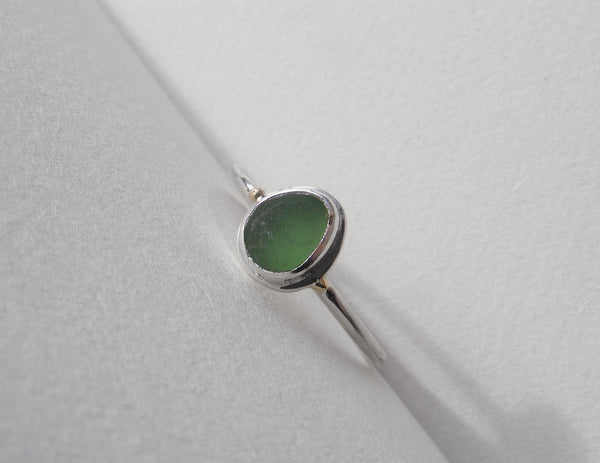 Sprite Green seaglass silver ring with gold nugget details. Q.5