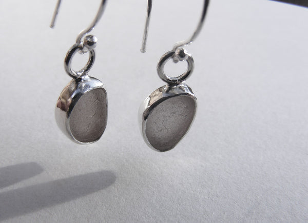 Clear seaglass, silver bezel set, drop earrings