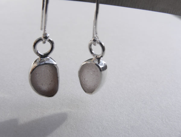 Clear seaglass, silver bezel set, drop earrings