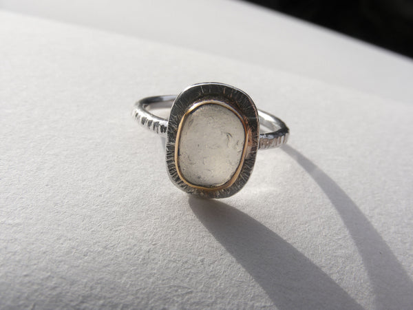 Clear sea foam sea glass ring bezel set in recycled 9ct gold