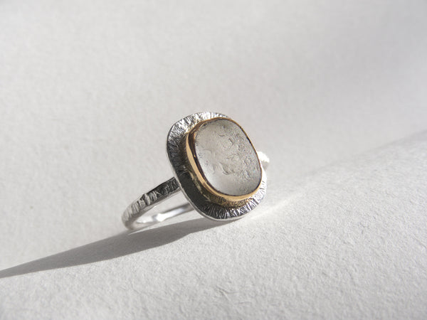 Clear sea foam sea glass ring bezel set in recycled 9ct gold