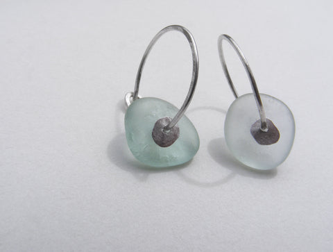 Sea Foam sea glass hoop earrings with a molten silver sequin
